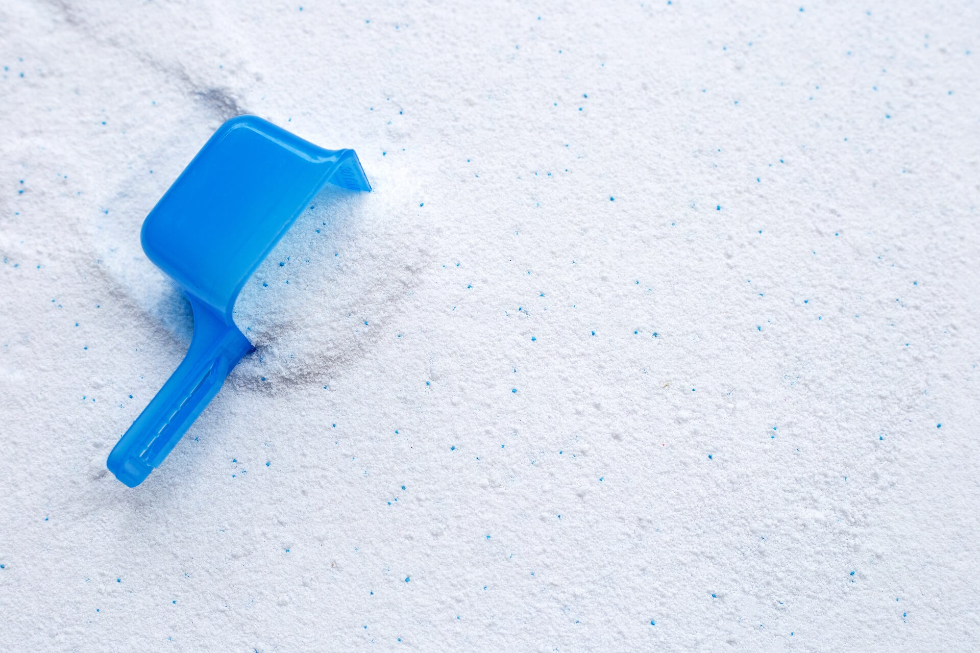 detergent-powder-with-measuring-spoon-clothes-washing-laundry-concept (1) detergent-powder-with-measuring-spoon-clothes-washing-laundry-concept (1)